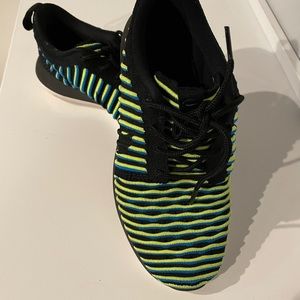 Lime green, black & blue Nike shoes